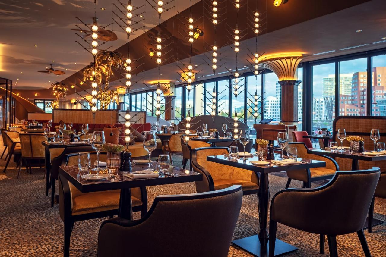 Hyatt Regency Dusseldorf Hotel Kültér fotó The interior of the restaurant