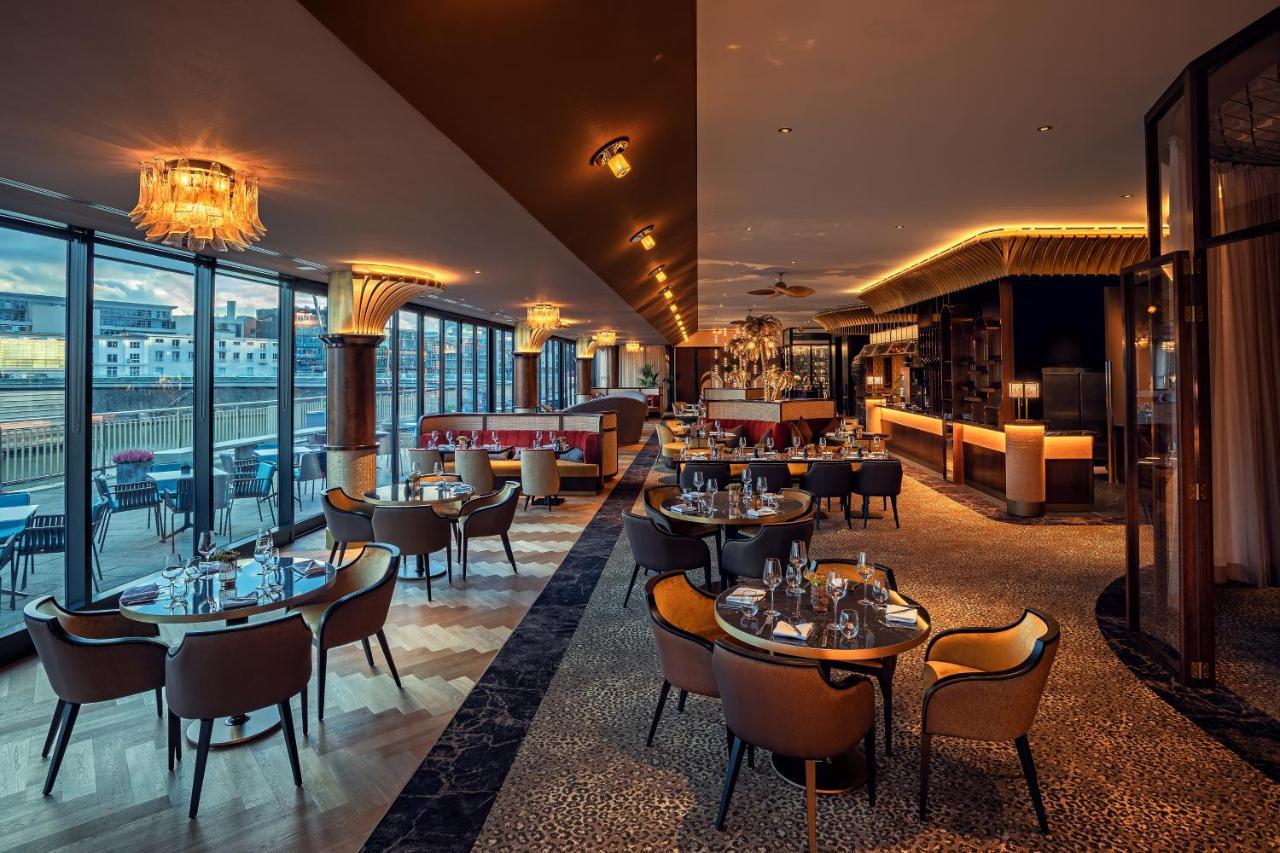 Hyatt Regency Dusseldorf Hotel Kültér fotó The interior of the restaurant