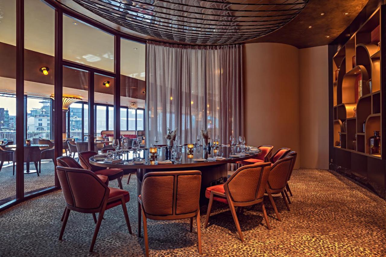 Hyatt Regency Dusseldorf Hotel Kültér fotó The restaurant's interior